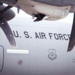 Shocking Oil Disruption: Ukraine’s SECRET Weapon U.S. Air Force airplane with visible propellers and insignia.
