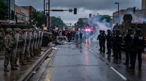 A tense standoff between law enforcement and protesters during a demonstration