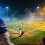 Super Catholic Snub? MLB Exec CAUGHT ON TAPE… Baseball game in progress at night with players on the field