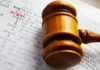 Skull Trophies Uncovered—County Skates Gavel on book page highlighting the word legal.