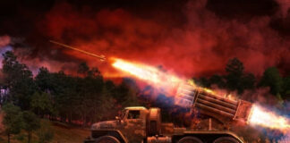 Military truck firing rockets at night.
