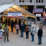 Hard-Left Takeover Nears The White House People at a voting station for the 2028 presidential election outside city hall