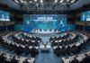 A large conference room filled with international leaders at Davos 2026