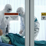 Patients and healthcare workers inside a quarantine zone.