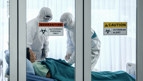 Patients and healthcare workers inside a quarantine zone.