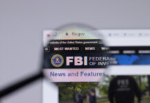 Website of FBI under magnifying glass.